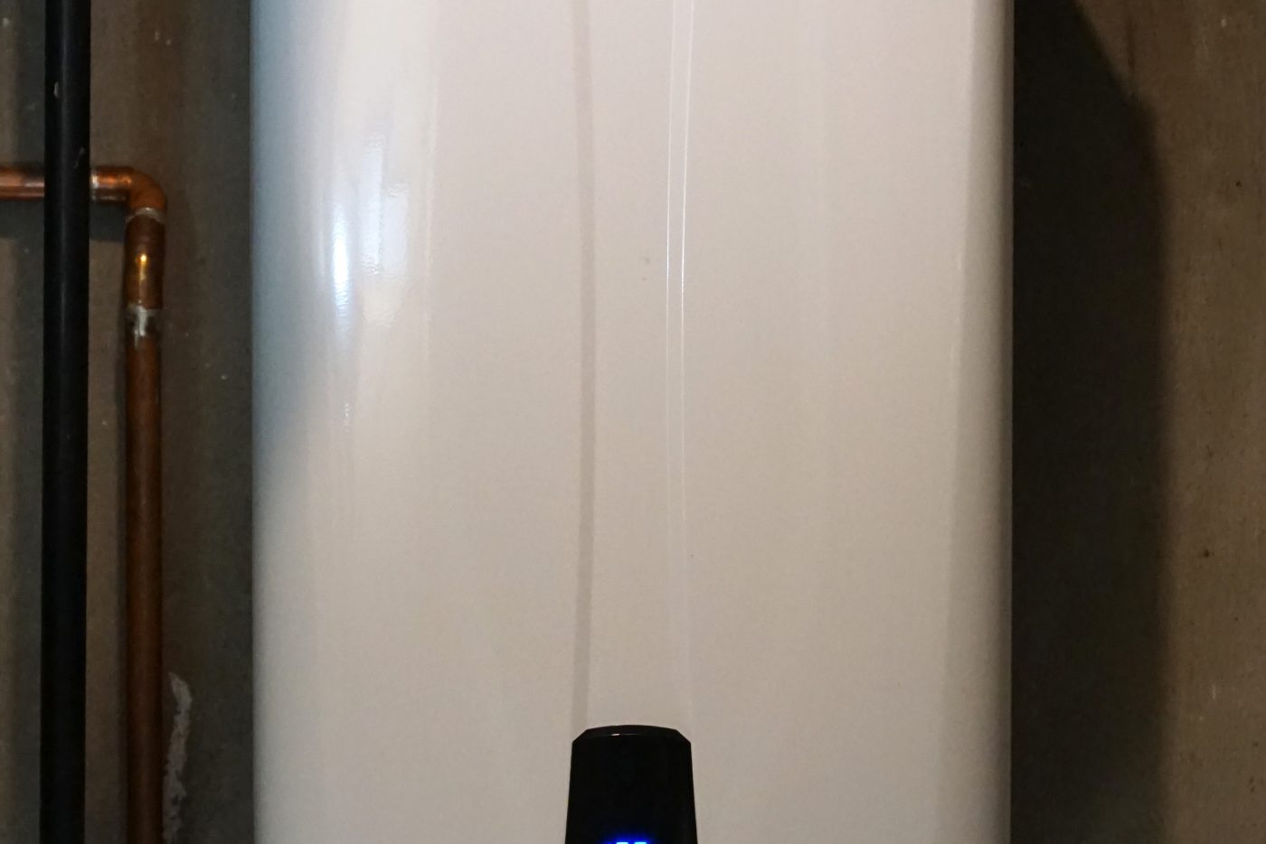 Residential water heater, representative of water heater repair and replacement.