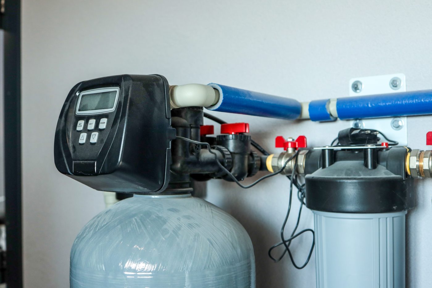 Water softener and filtration system, representative of water treatment installation.